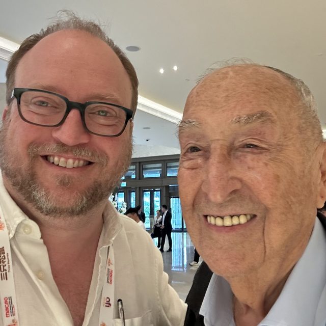 Lalo with an industry colleague at a congress